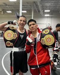 Marquez and Dan coming home with belts today at The Red Wave