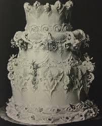 Can a simple wedding cake still pop with flowers? History Of Cakes And Cake Decorating Confectionary Chalet