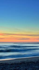 Follow the vibe and change your wallpaper every day! Beach Mist Blue Orange Sky Sunset Nature 1080x1920 Wallpaper Orange Sky Sunset Nature Beach Wallpaper