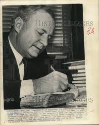 1963 Press Photo Price Daniel writes note in Bible for new Texas governor