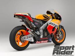 Honda To Produce Supersport Bike Based On Motogp Rc213v Honda Street Bikes Racing Bikes Motogp