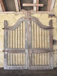 This monumental antique wooden antique door completely in teakwood & iron pegs is procured from one of the large havelis of the old times. A Pair Of Vintage Wooden Garden Gates Architectural Heritage