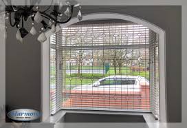 Rolls up from the bottom to provide privacy at street made to measure wooden venetian blinds fitted for home in acton, london #woodenblinds #woodvenetians #baywindow #officeblinds. Bay Window Blinds Inspiration For Blinds For Your Bay Window