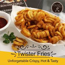 Enjoy Tasty Crispy Hot Yummy Twister Fries At Round Table Tasty Food Crispy