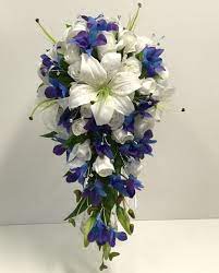 Blue and cream cascading wedding bouquets. Blue Purple Singapore Orchids White Tiger Lily Cream Roses Teardrop Fall Wedding Bouquets Bridesmaid Flowers Teardrop Bouquet