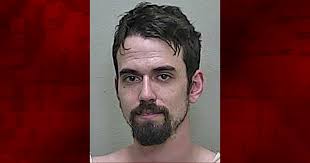 Man accused of battering woman and interfering with her 911 call