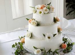 Wedding cake with flowers on top. Top 10 Suppliers For Wedding Cakes In Sydney 2021 Wedding Diaries