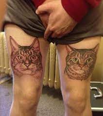 Bad Tattoos 14 Of The Worst Gone Wrong Team Jimmy Joe Tabby Cat Tattoo Bad Tattoos Cat Tattoo