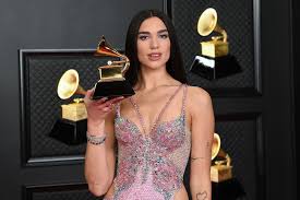 Every year, the grammys celebrates the music industry's top artists and tracks. The Story Behind Dua Lipa S Grammys Afterparty Dress