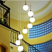 The globes and shades are crafted from glass, metal, milk glass, plastic, aluminum, lucite, acrylic and nylon. Modern Pendant Light With 8 Lights In White Globe Shade