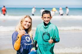 Young surfer coming to the surface from under a wave, cornwall, uk. Love Island S Lucie Donlan Helped Anxious Children Learn To Surf Cornwall Live