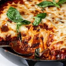 Eggplant Layered With Tomatoes Mushrooms And Cheese And Baked Until Golden And Bubbling Parmigiana Di Melanza Recipes Quick Vegetarian Meals Melanzane Recipe