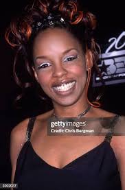Headshot of American rapper Rah Digga smiling as she attends the... News  Photo
