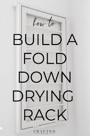 Plywood and dowels, and very simple tools. Diy Fold Down Drying Rack Crafted By The Hunts