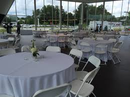 White Hercules Chairs And 60 Round Tables At The Jim Ellis Audi Atlanta Showroom Party Eve Shabby Chic Table And Chairs Table Linen Rentals Chairs For Rent