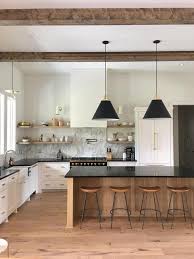 That said, we suggest avoiding lucite, plastic, and anything overtly unnatural as they'll confuse the eye and aren't in sync with modern farmhouse interior design. Inspiration Wood Kitchens Lark Linen Modern Kitchen Hood Neutral Kitchen Designs Kitchen Style