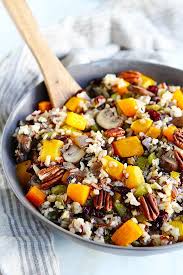 This recipe features wild rice tossed in a gingery dressing, with roasted butternut squash, fresh pomegranate, goat cheese, and pepitas (green pumpkin seeds). Wild Rice Stuffing Recipe