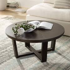 Shop louie brown wooden coffee table with glass top and other modern and contemporary home and office furniture. Conrad 40 Wide Dark Brown Wood Round Coffee Table 56k68 Lamps Plus