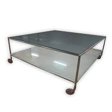 Low profile glass display top basket weave coffee table on factory cart wheels. Square Coffee Table With Glass Top And Wheels 100 5cm Kaki Lelong Everything New And Second Hand