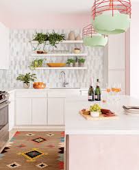 Flooring is reclaimed antique solid white oak. A Playful Fashion Inspired Pink Kitchen In A Seaport Condo