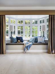 This inviting setup is created by kate jackson design. Window Treatments For Large Bay Window