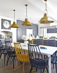 Modern Kitchen With Yellow And Grey Accessories The Room Edit Grey Yellow Kitchen Yellow Dining Room Yellow Kitchen Decor