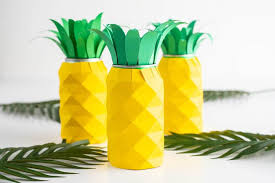Host a great hawaiian luau party with these ideas for decorations, costume, food and drinks, party games, music, volcano cakes. Pineapple Centerpiece Hawaiian Luau Decor Hawaii Travel With Kids