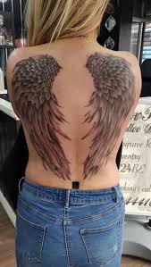 Wing tattoos are simply tattoos that are made up of wings, either partly or in full. Forearm Angel Wing Arm Tattoos Novocom Top