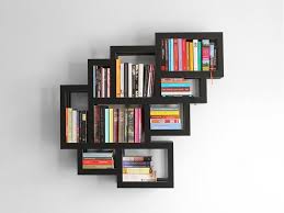 13 of 22 even just a few striking objects can create a visually interesting display. Wall Mounted Bookcase Design Wall Bookshelves Wall Mounted Bookshelves Wall Hanging Bookshelf