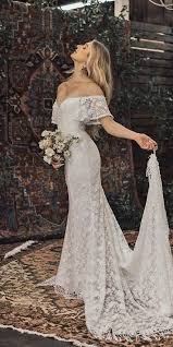 Boho wedding dresses are popular because they create an enchanting and romantic look without too much fuss. 24 Lace Boho Wedding Dresses To Inspire You Wedding Dresses Guide Boho Wedding Dress Lace Off Shoulder Wedding Dress Wedding Dress Long Sleeve