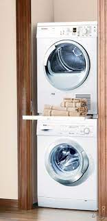 Washer and dryer sets are an integral purchase for any individual or family settling into a new home or rental. Bosch Axxis Series Wtz11300uc Stacking Kit With Pull Out Tray Laundry Room Storage Stackable Laundry Laundry Room Storage Shelves