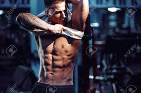 The most important thing to remember when finalizing your fitness model diet is making sure that it is fitted to suit your needs. Side View Of A Caucasian Handsome Fitness Model Posing In The Stock Photo Picture And Royalty Free Image Image 124528175
