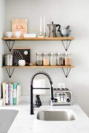 Browse 209 shelves above sink on houzz whether you want inspiration for planning shelves above sink or are building designer shelves above sink from scratch, houzz has 209 pictures from the best designers, decorators, and architects in the country, including crystal kitchen + bath and michael knowles, architect. Create More Kitchen Storage Install Open Shelving Above The Sink Heather Bien