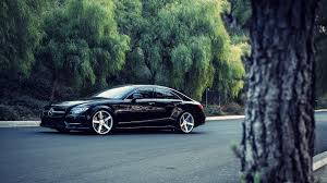 Black Mercedes Benz Sedan On Gray Concrete Road Near Trees During Daytime Mercedes Benz Supercars Merce Mercedes Cls550 Mercedes Benz Sedan Mercedes Benz Suv