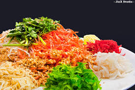 It looks like yee sang indeed originated from malaysia and specifically reflects the cantonese traditions. 20130217 Chinese New Year Dinner Yee Sang Yusheng Yee Flickr