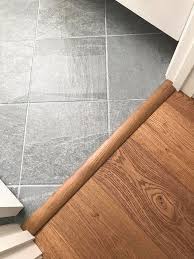 Transition From Engineered Hardwood To Tile Impressions Hardwood Denali In Wheat Color Florida Tile Clif Transition Flooring Light Hardwood Floors Flooring