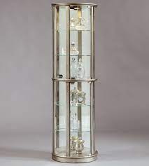 Check out the different designs like classic tracery patterns, a customer favorite. Pulaski Furniture Curios Platinum Glass Door Curio Cabinet Wayside Furniture Curio Cabinets