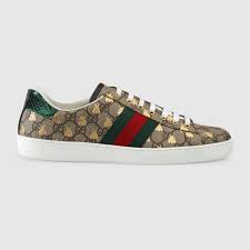 Since its debut, the ace sneaker has become a mainstay of the house's collections. Men S Ace Sneaker Gg Supreme With Gold Bees Gucci Ae