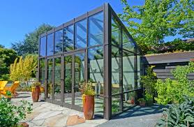 10 Gorgeous Greenhouses To Get You Excited For Spring Modern Greenhouses Contemporary Greenhouses Backyard Greenhouse