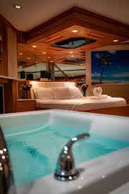 The property has an outdoor pool, fitness centre, hot tub and bar. Deluxe Whirlpool Suite Sybaris Romantic Weekend Getaways In Chicago Milwaukee Indianapolis