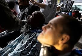 Volunteers offer free haircuts and a Thanksgiving feast in Kensington