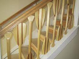 Stair Railing Created From Canoe Paddles Coastal Living Rooms Lake Life Decor Stair Railing Design