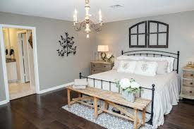 These natural elements come together to create a solid, rich look that fits with almost any style (especially rustic and country styles). A Fixer Upper Dilemma Classic And Traditional Vs New And Modern Fixer Upper Bedrooms Master Bedrooms Decor Romantic Master Bedroom