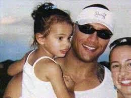 Classic photo of WWE Superstar The Rock (Dwayne Johnson) with his wife Dany  Garcia Johnson and their daughter Simone Alexandra Johnson #WWE #wwecouples  #wwewives #wwewags #wwefamilies #wwekids #samoandynasty
