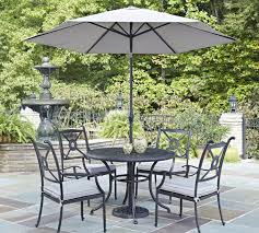 Set up an outdoor oasis: Furniture Home Store Home Furniture Decor 5 Piece Patio Dining Set With Swivel Chairs