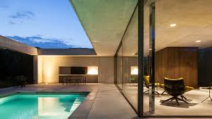 The pool house was pushed against the pool, preserving the lot and creating a dynamic relationship between the 2 elements. Pool House Design And Architecture Dezeen