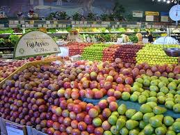 Color photograph of an apple display at a local grocery store. File Apples Supermarket Jpg Wikimedia Commons