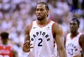 The raptors bench mobs him. Watch Raptors Kawhi Leonard S Bouncing Buzzer Beating Game 7 Winning Shot Over The 76ers The Denver Post