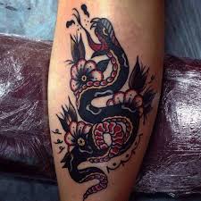 Snake tattoos are hugely popular all over the world! Traditional Snake Traditional Snake Tattoo Traditional Tattoo Tattoos