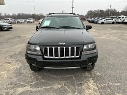 Image result for Brilliant Black 2004 Jeep